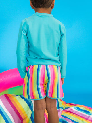 RuffleButts + RuggedButts - Boys Neon Rainbow Stripe Performance Hybrid Dolphin Hem Swim Trunks