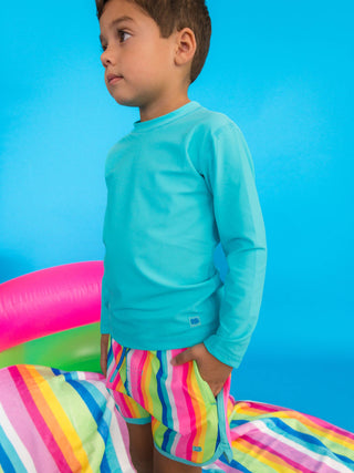 RuffleButts + RuggedButts - Boys Neon Rainbow Stripe Performance Hybrid Dolphin Hem Swim Trunks