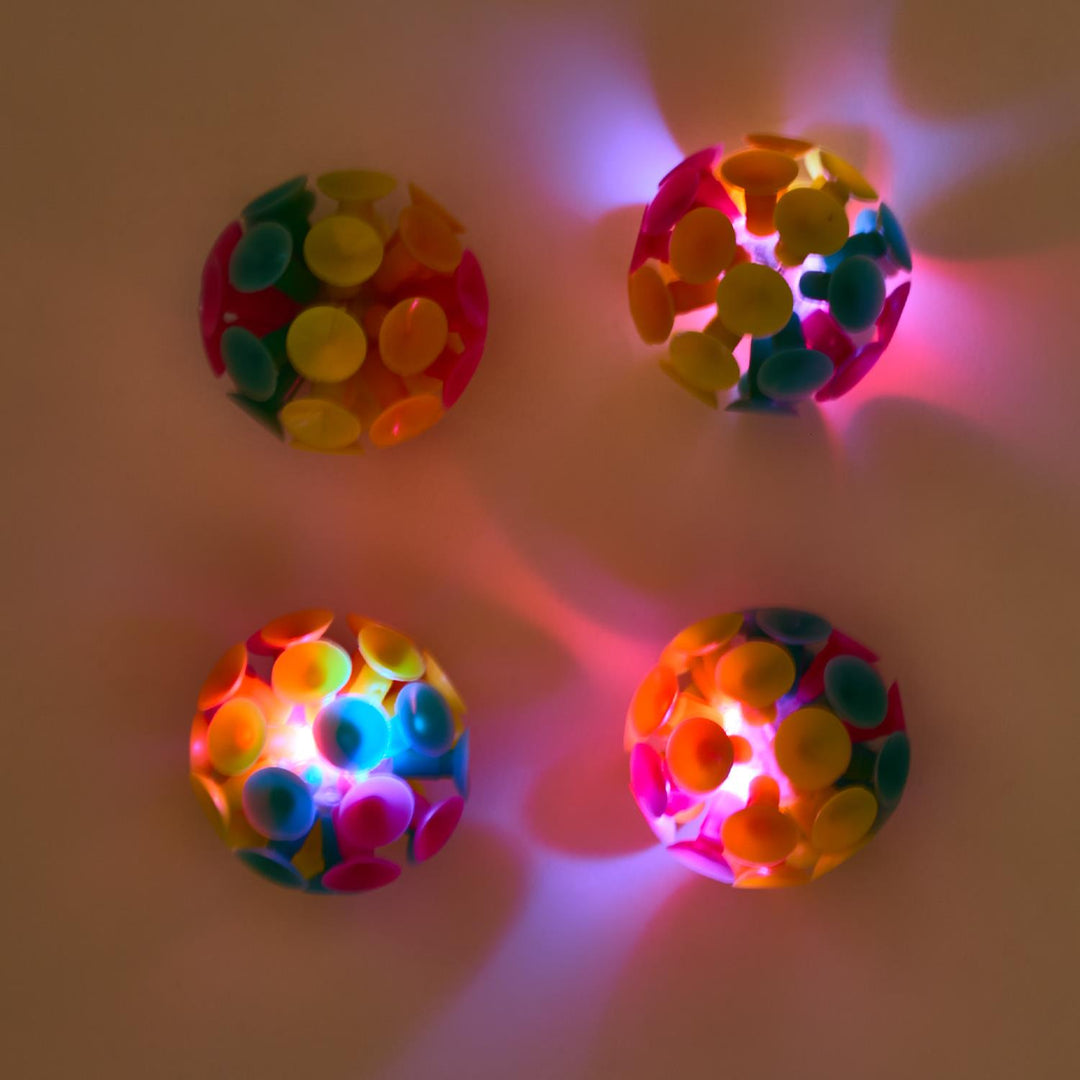 Two's Company Rainbow Light Up Suction Ball