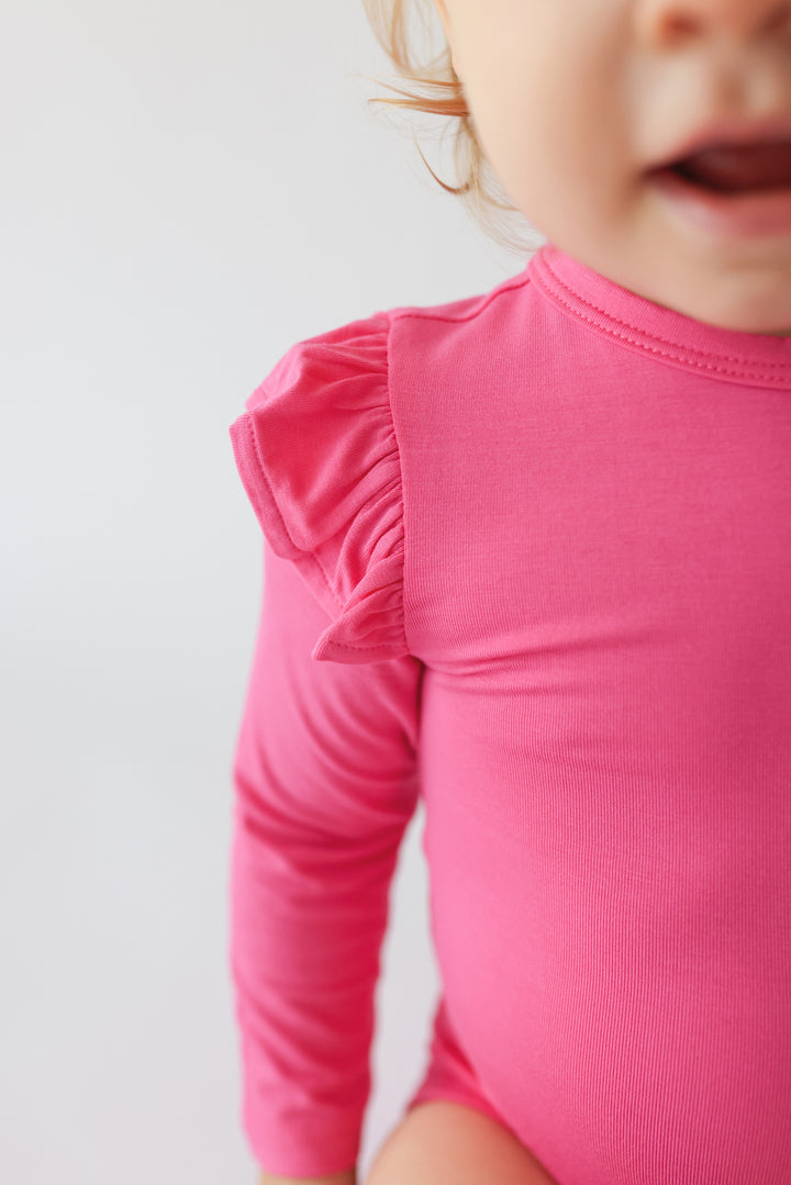 Posh Peanut Hot Pink Long Sleeve Ruffled Bodysuit