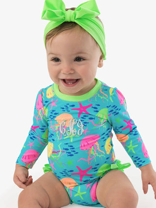 RuffleButts + RuggedButts - RuffleButts + RuggedButts - Baby Girls Neon Jelly Time Long Sleeve One Piece Rash Guard Swimsuit with Signature Rear Ruffles - Classy Rascals Boutique
