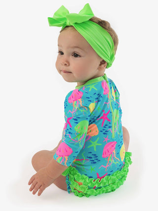 RuffleButts + RuggedButts - RuffleButts + RuggedButts - Baby Girls Neon Jelly Time Long Sleeve One Piece Rash Guard Swimsuit with Signature Rear Ruffles - Classy Rascals Boutique