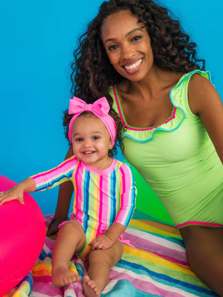 RuffleButts + RuggedButts - RuffleButts + RuggedButts - Baby Girls Neon Rainbow Stripe Long Sleeve One Piece Rash Guard Swimsuit with Signature Rear Ruffles - Classy Rascals Boutique