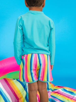 RuffleButts + RuggedButts - RuffleButts + RuggedButts - Boys Neon Rainbow Stripe Performance Hybrid Dolphin Hem Swim Trunks - Classy Rascals Boutique