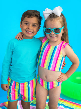 RuffleButts + RuggedButts - RuffleButts + RuggedButts - Boys Neon Rainbow Stripe Performance Hybrid Dolphin Hem Swim Trunks - Classy Rascals Boutique